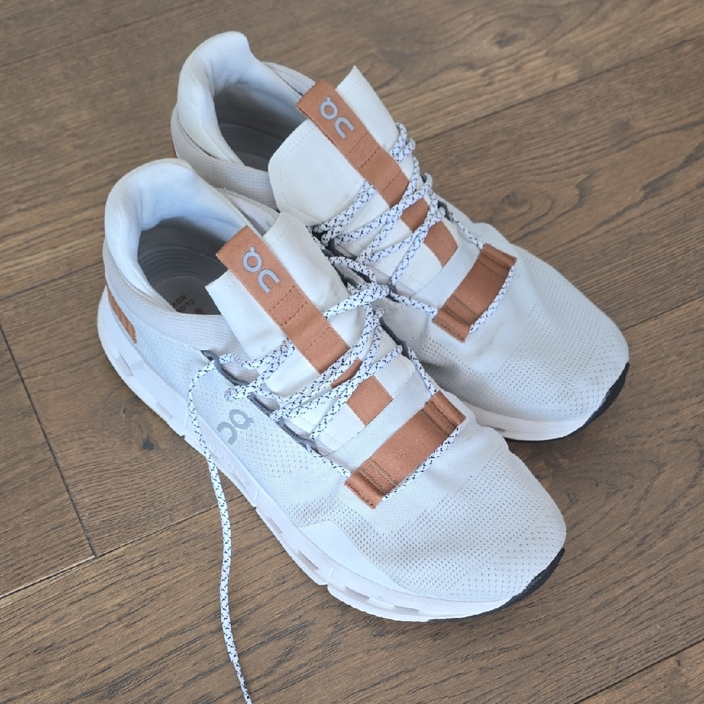 On Running White and Copper Athletic Shoes